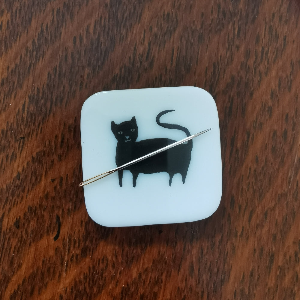 Glass needle minder by Sid Barlow