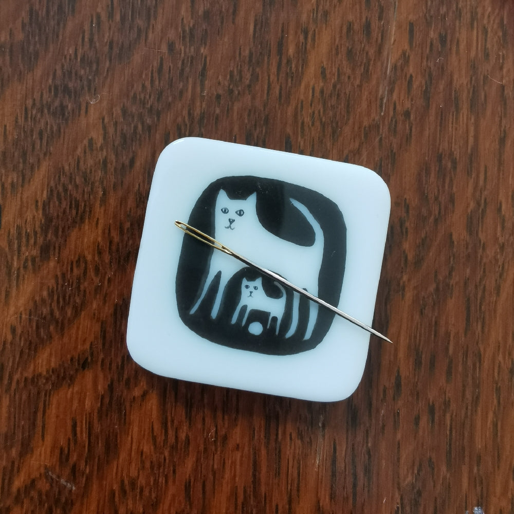 Glass needle minder by Sid Barlow